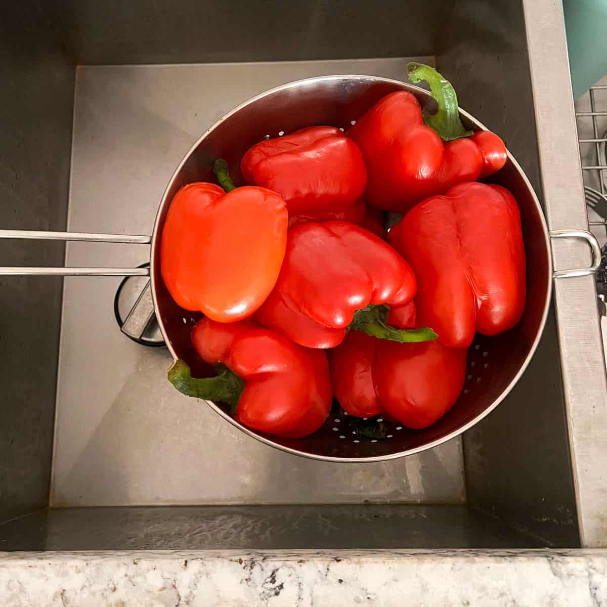 strainer ichaita ne blanched red bell pepper halves.