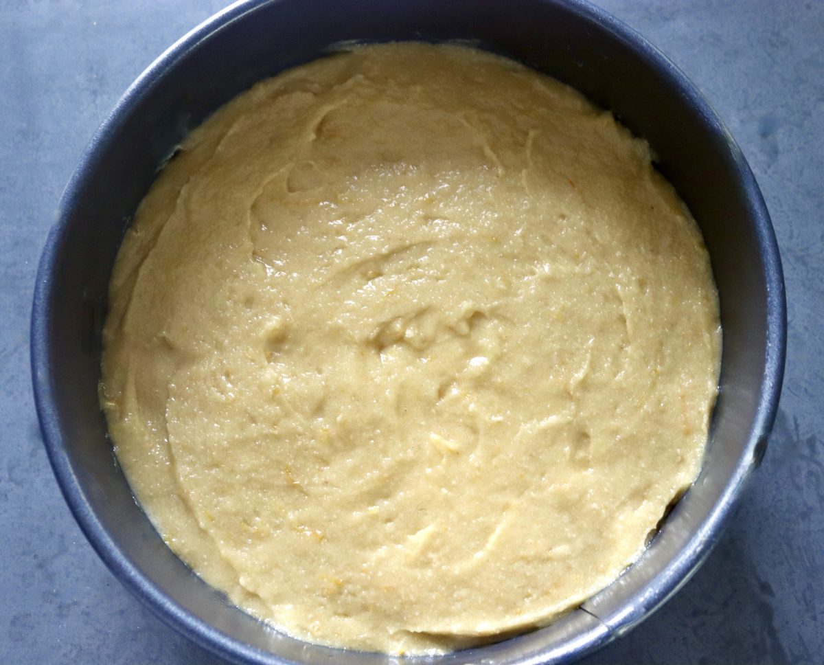 Raw lemon cake batter in cake pan. 