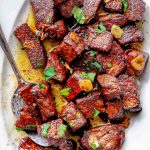 Steak Bites on platter with spoon