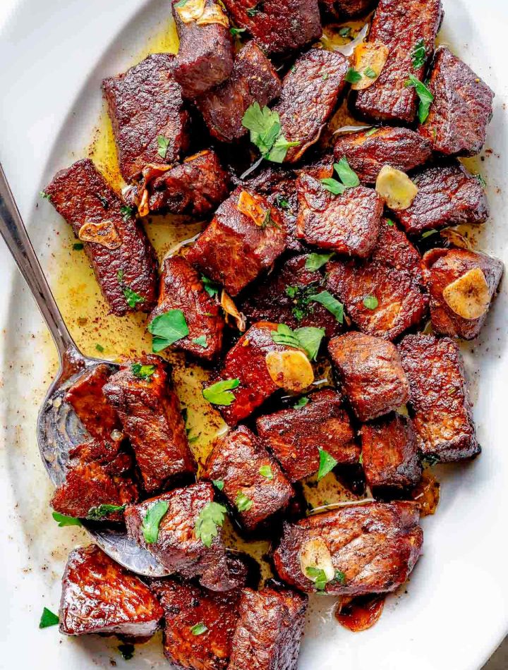 Steak Bites on platter with spoon