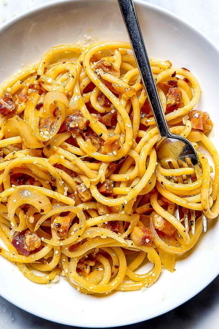 Chili Crisp Carbonara in a bowl with a fork